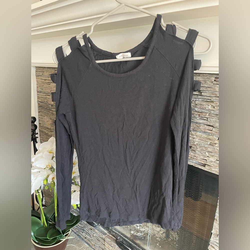 Black top with square patterned open sleeves